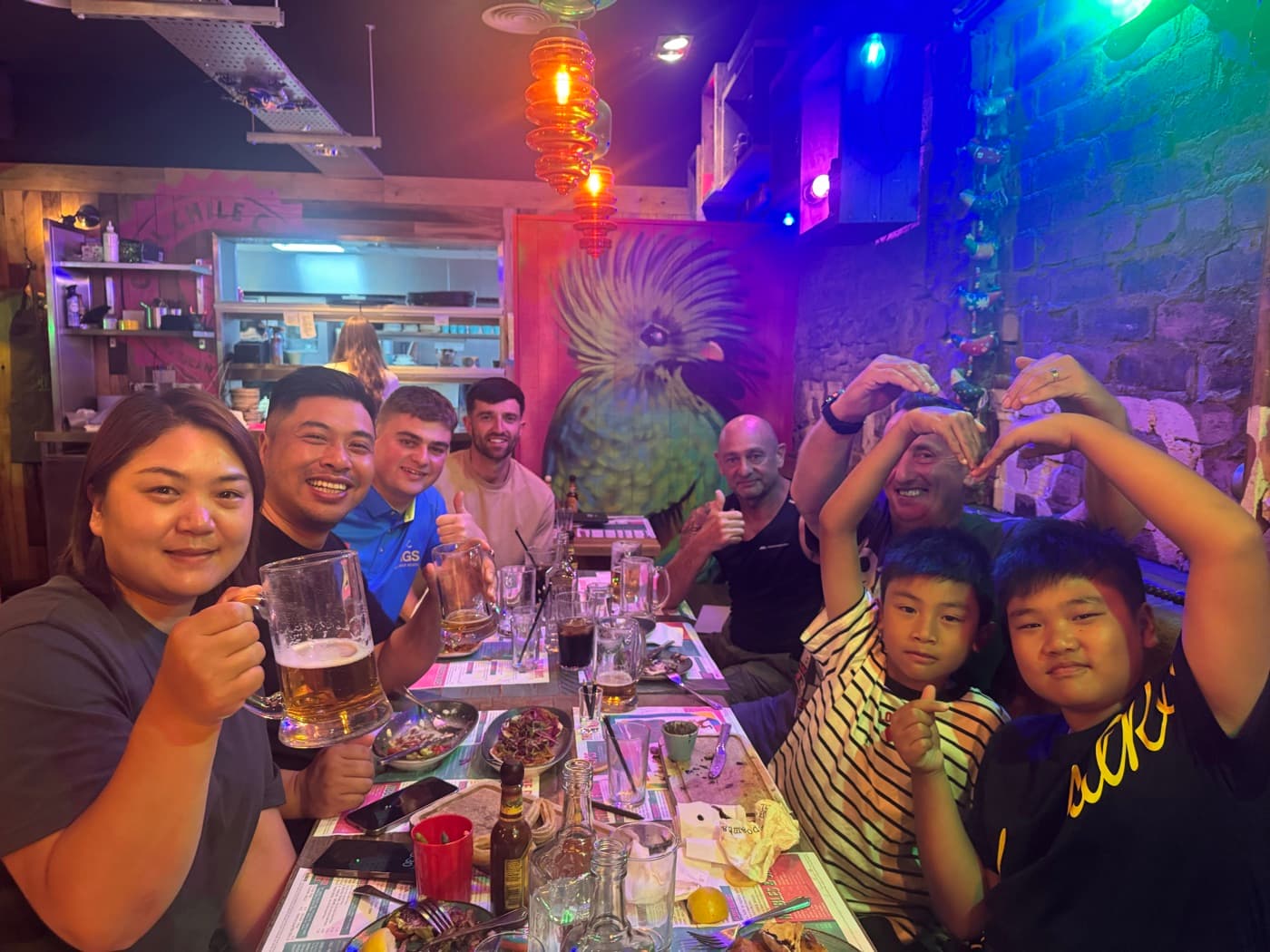 AGS guests celebrating together after their round